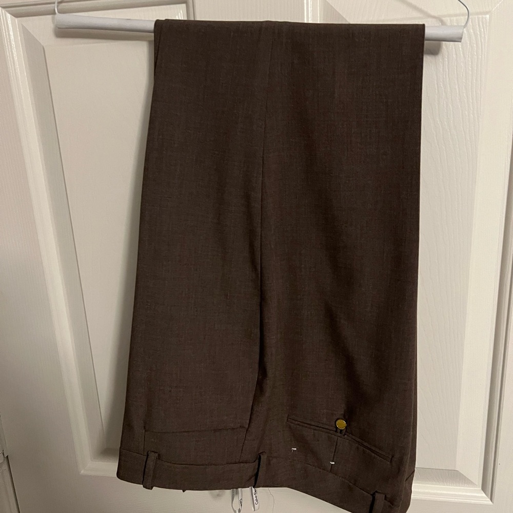 Women’s 3 piece suit. Jacket, slacks and skirt.